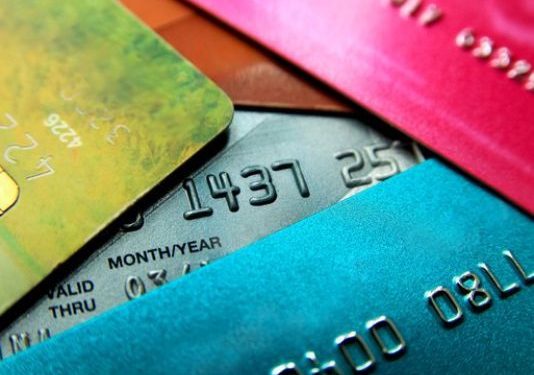 Credit card debt hits new record, raising warning sign