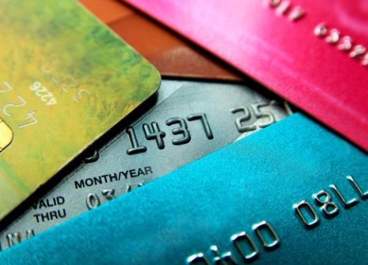 Credit card debt hits new record, raising warning sign