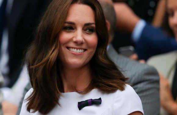 Duchess Kate is perfection in a plum Seraphine maternity coat